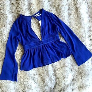 Urban Outfitters Blue V neck and open back shirt